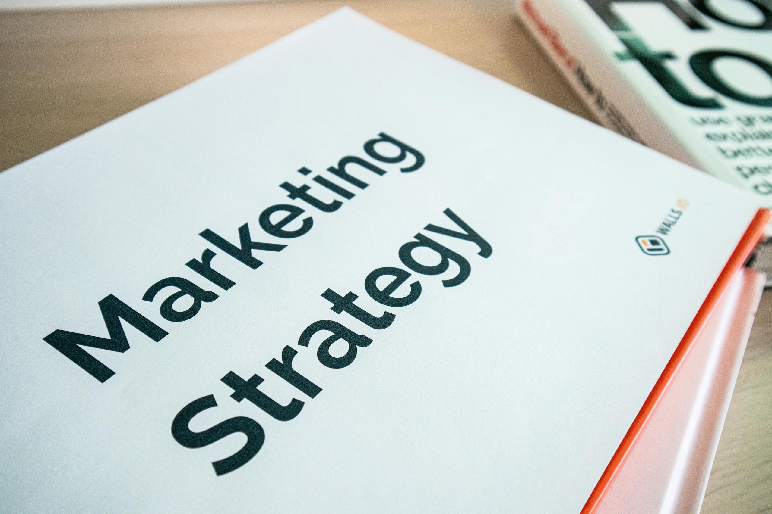 Close-up of a marketing strategy document on a desk, ideal for business content.